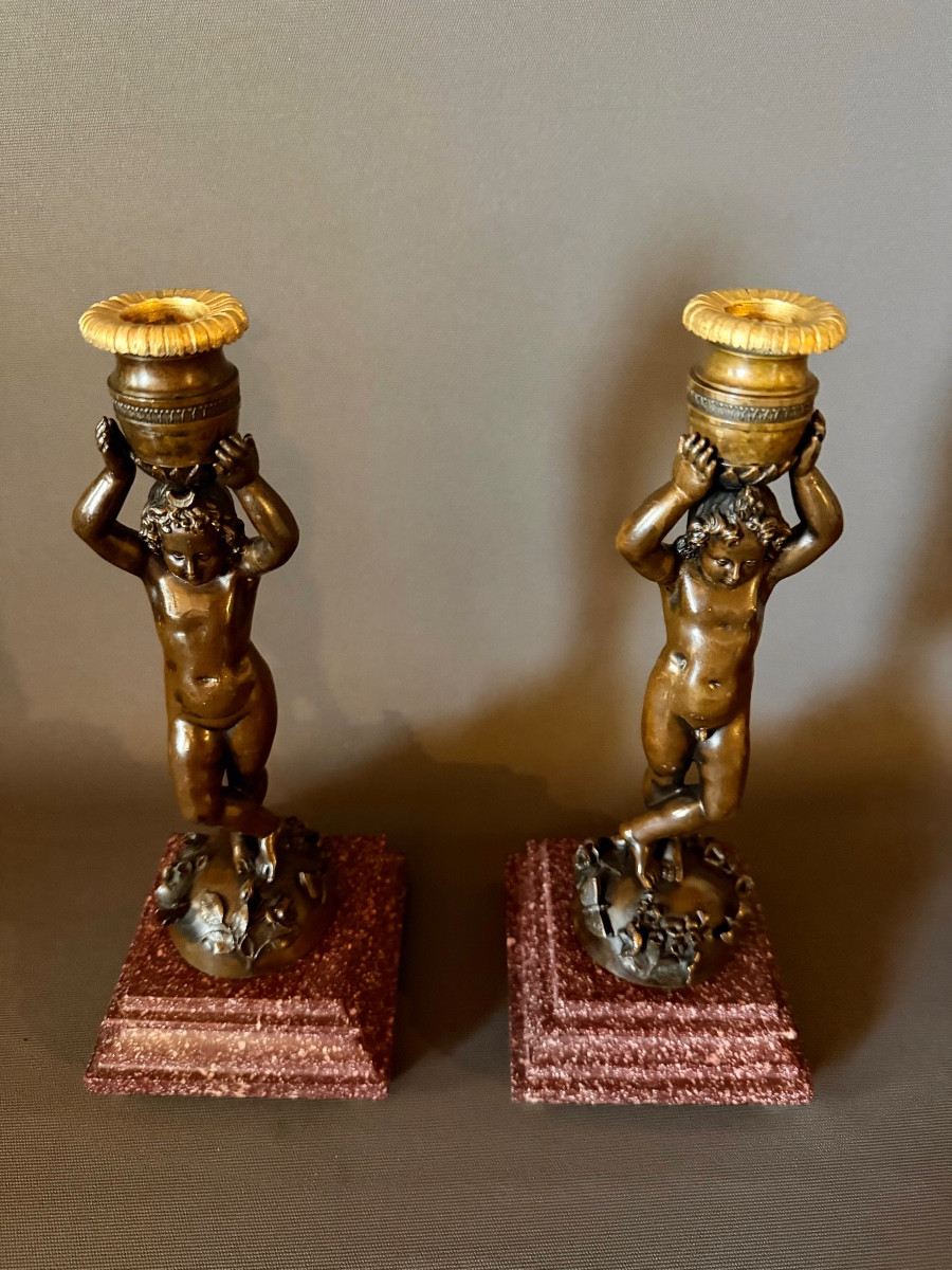 A Pair Of Patinated Bronze Candlesticks With Putti Depicted As Canephores. Circa 1850-photo-3