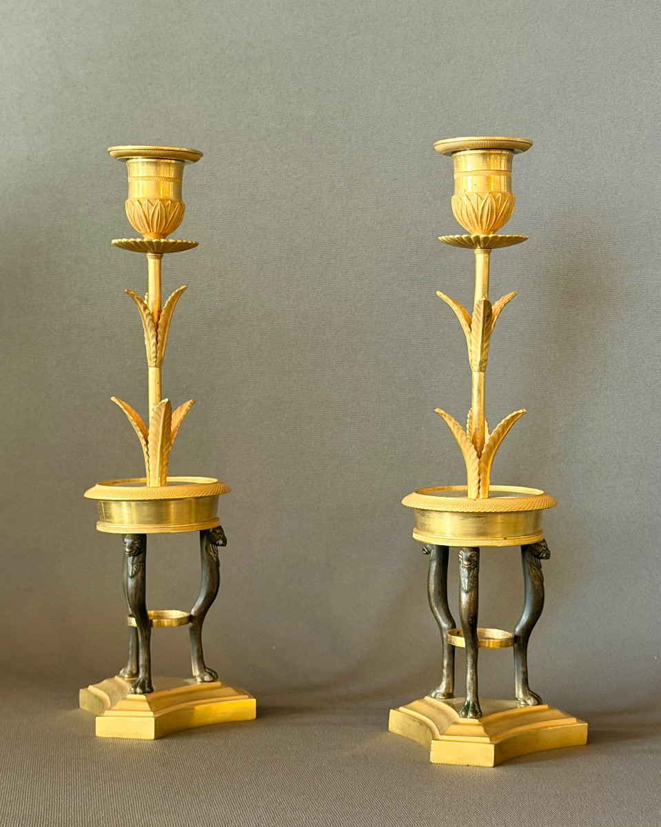 A Pair Of Consulat Gilt And Patinated Bronze Candlesticks. Circa 1800