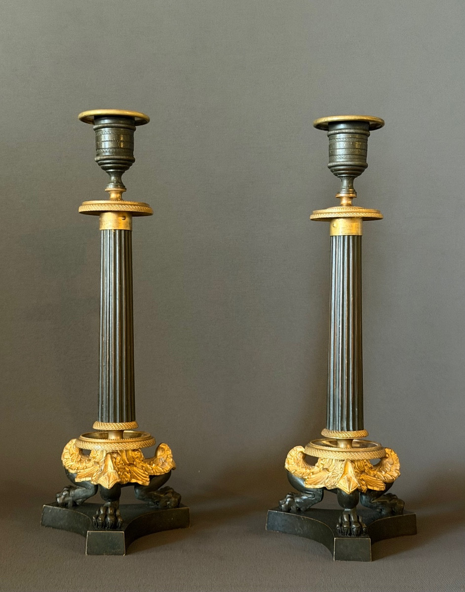 A Pair Of Restauration Patinated And Gilt Bronze Candlesticks. Circa 1830