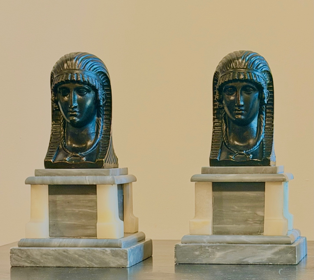 A Pair Of Empire Patinated Bronze Figures Depicting Egyptian Female Heads