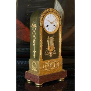 An Empire Gilt And Patinated Bronze Mantle Clock. Mesnil In Paris. 