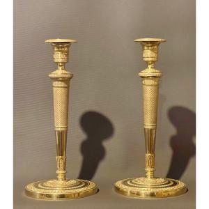 Paire de flambeaux d’époque Empire en bronze doré dans le goût de Claude Galle. Début du XIXe 