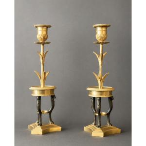 A Pair Of Consulat Gilt And Patinated Bronze Candlesticks. Circa 1800