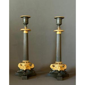 A Pair Of Restauration Patinated And Gilt Bronze Candlesticks. Circa 1830