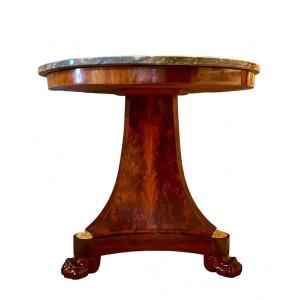 An Empire Period Round Mahogany And Mahogany Veneer Pedestal Table. Early 19th Century. 