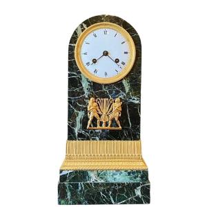 An Empire Ormulu-mounted Green Marble Mantle Clock. Early 19th Century. 