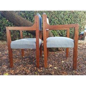 Paire de fauteuils vintage en teck