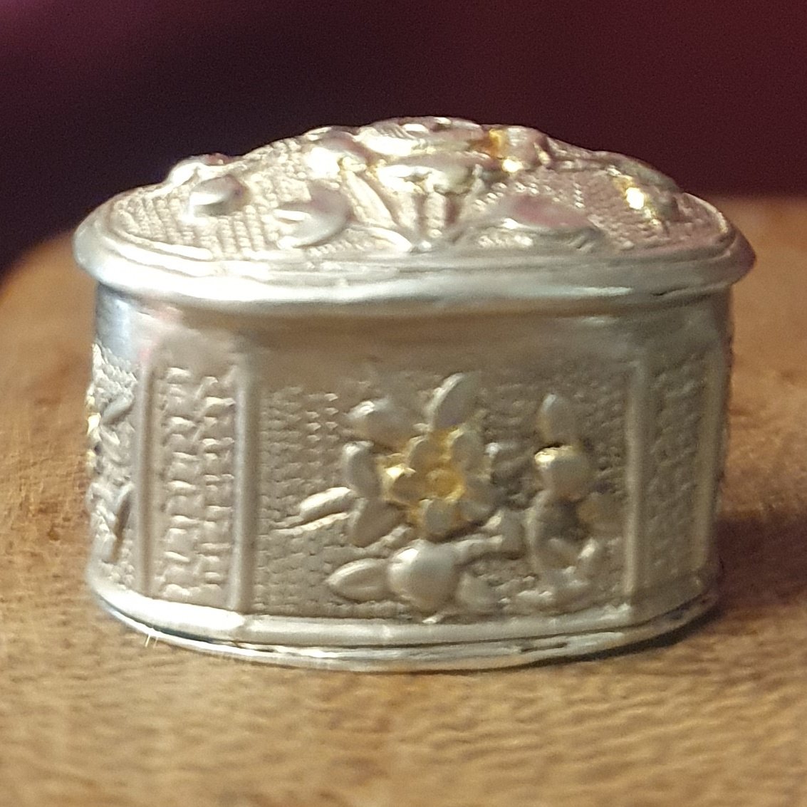 Oval Silver Box, Unhallmarked, With Floral Decoration And Gilded Highlights
