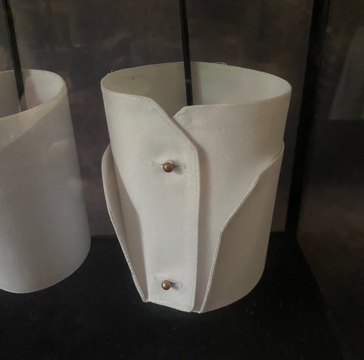 Old Glass And Iron Display Cabinet Containing A Series Of Shirt Cuffs.-photo-3
