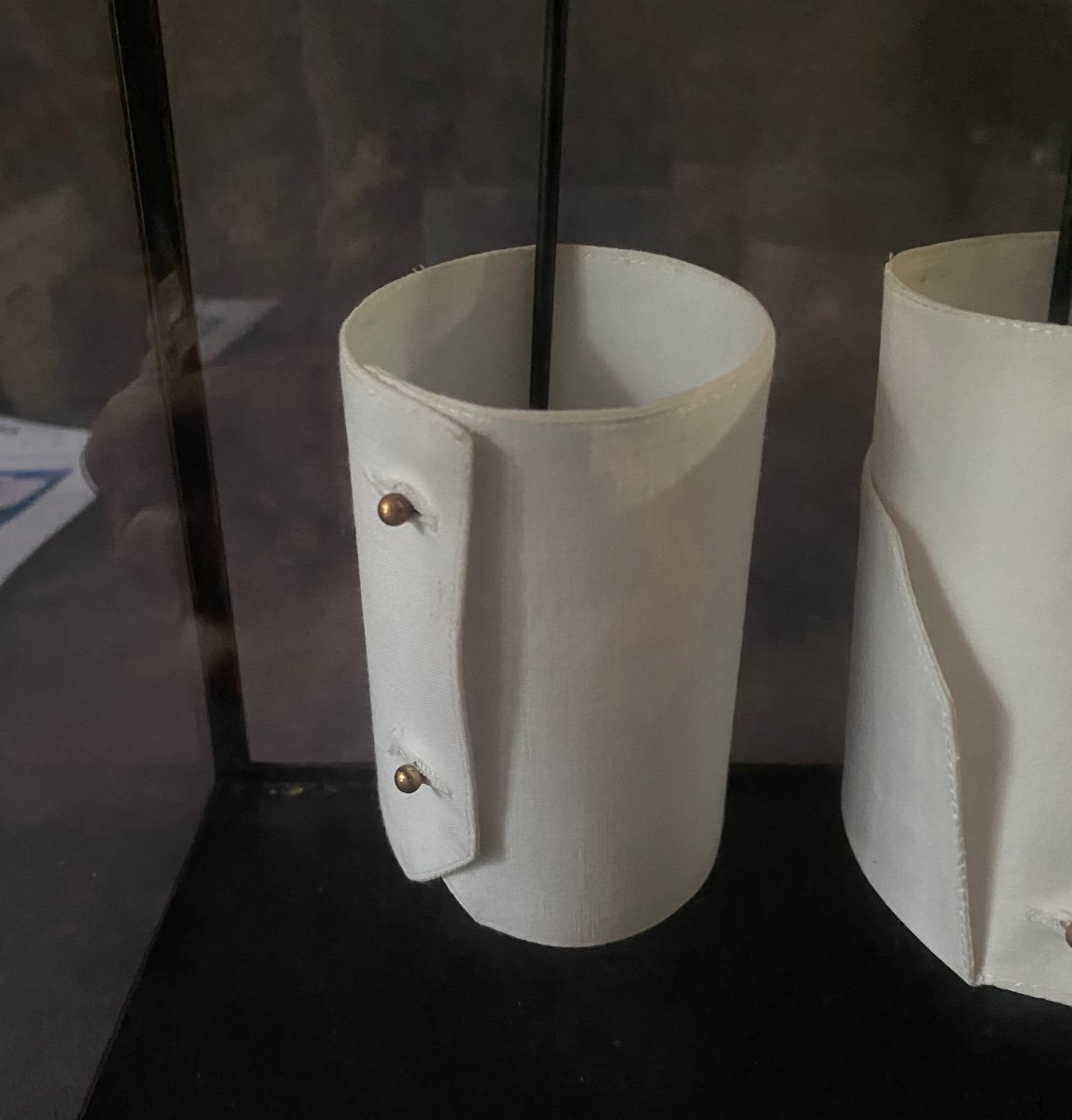 Old Glass And Iron Display Cabinet Containing A Series Of Shirt Cuffs.-photo-4