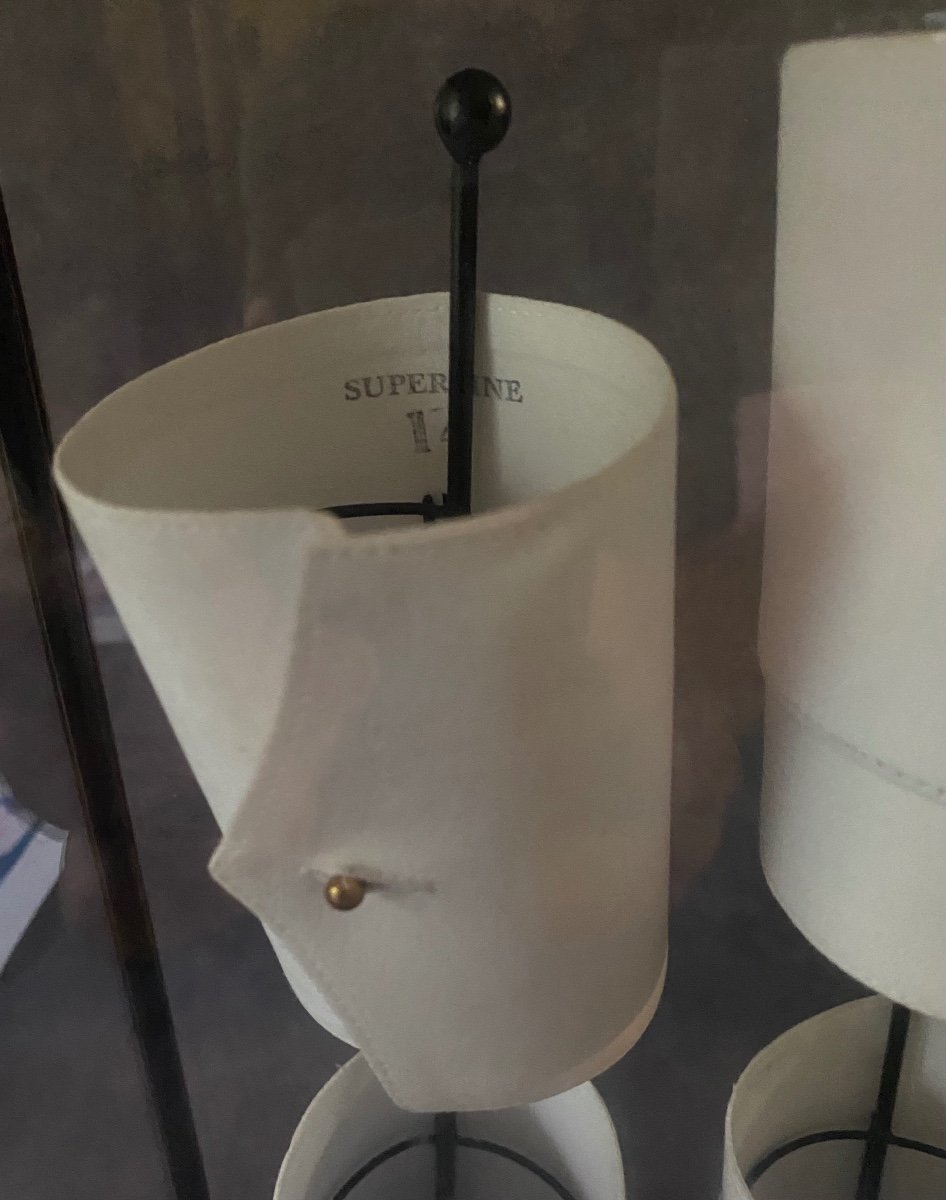 Old Glass And Iron Display Cabinet Containing A Series Of Shirt Cuffs.-photo-1