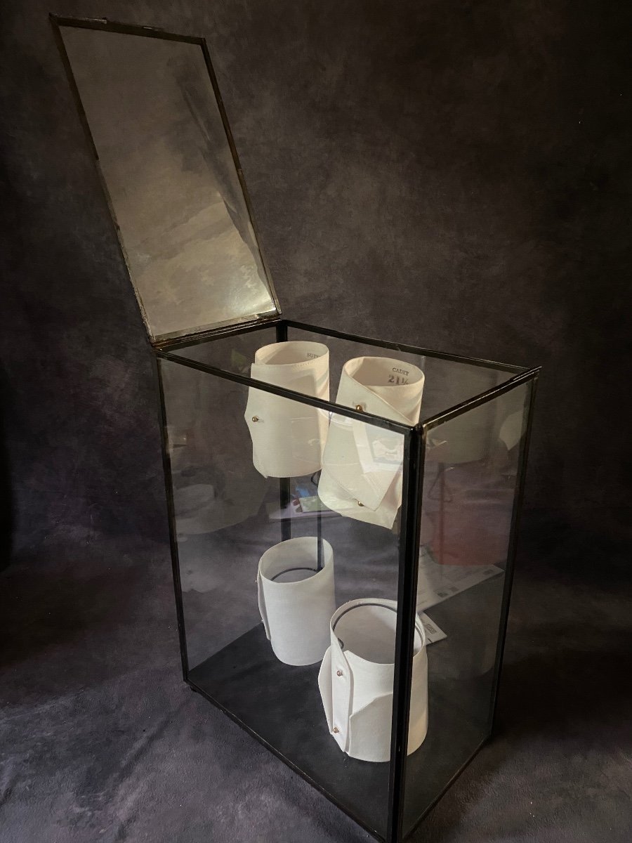 Old Glass And Iron Display Cabinet Containing A Series Of Shirt Cuffs.-photo-4