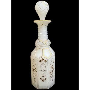 White Opaline Glass Carafe With A Faceted, Octagonal Cylindrical Shape