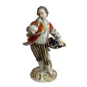 Meissen - Figurine en porcelaine d’un enfant jardinier au chapeau