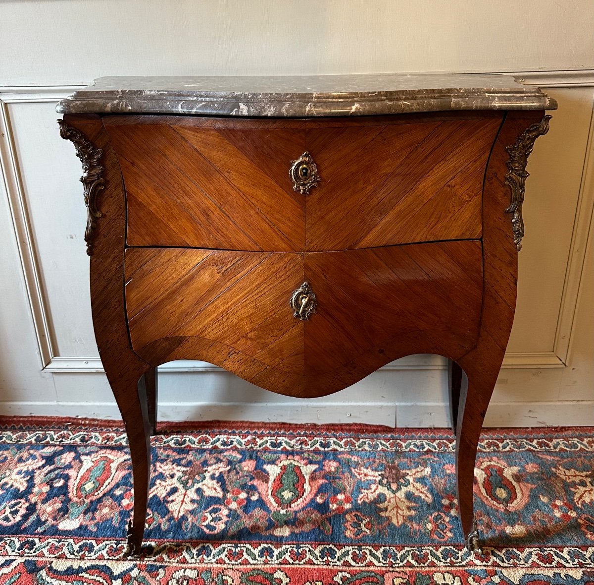 Small Louis XV Commode From Early XIXth Century. In Marquetry.