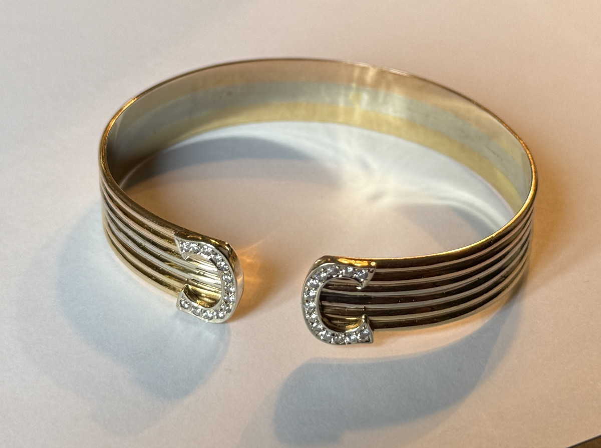 Bracelet double C  diamants et trois ors modèle Cartier   