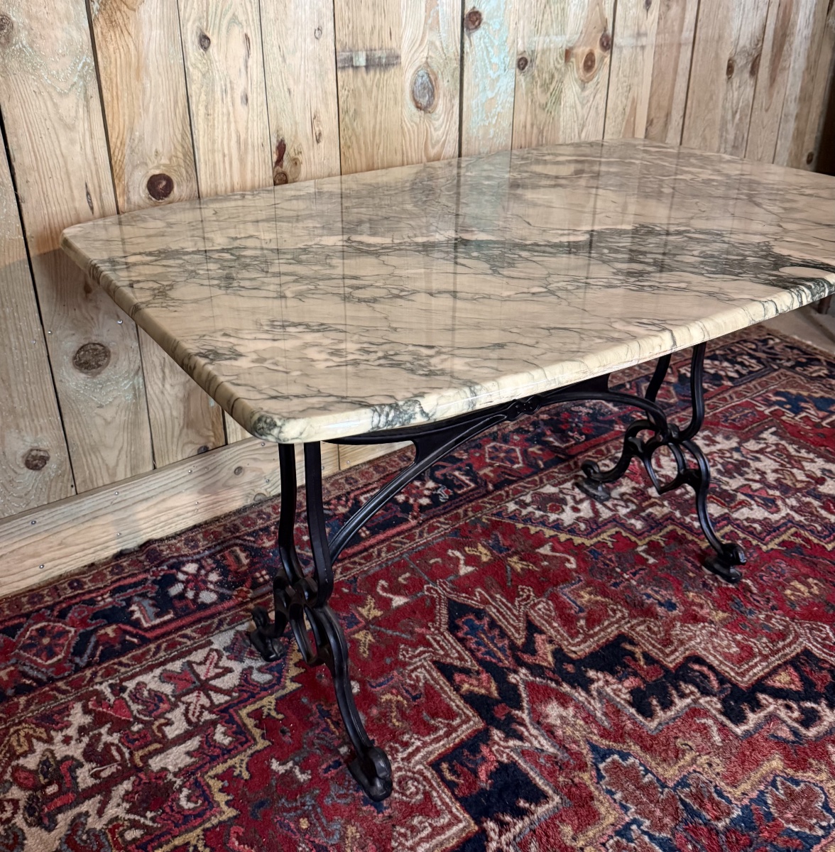 Large Bistro Table Made Of Marble And Cast Iron. -photo-1