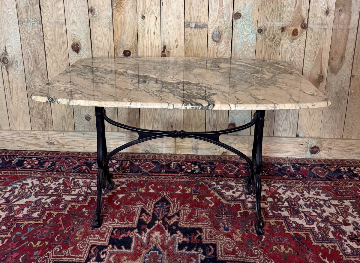 Large Bistro Table Made Of Marble And Cast Iron. 