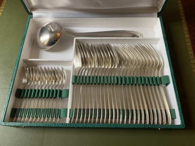 Art Deco Cutlery Set In Silver Metal.