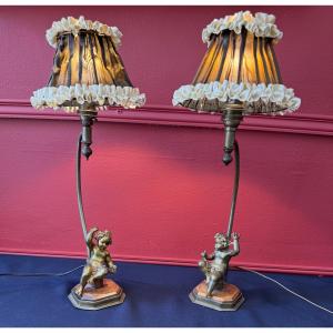 Paire de lampes de table aux amours en bronze, d'époque XIX  ème. 