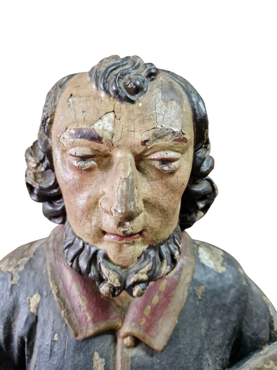 Statue Of A Saint With A Book-photo-3