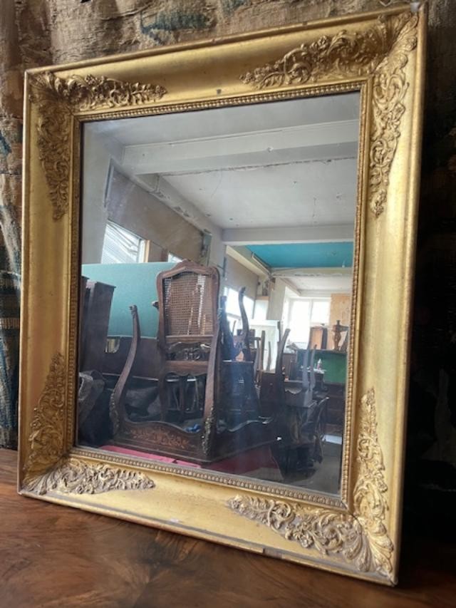 Miroir en bois et stuc doré d'époque empire