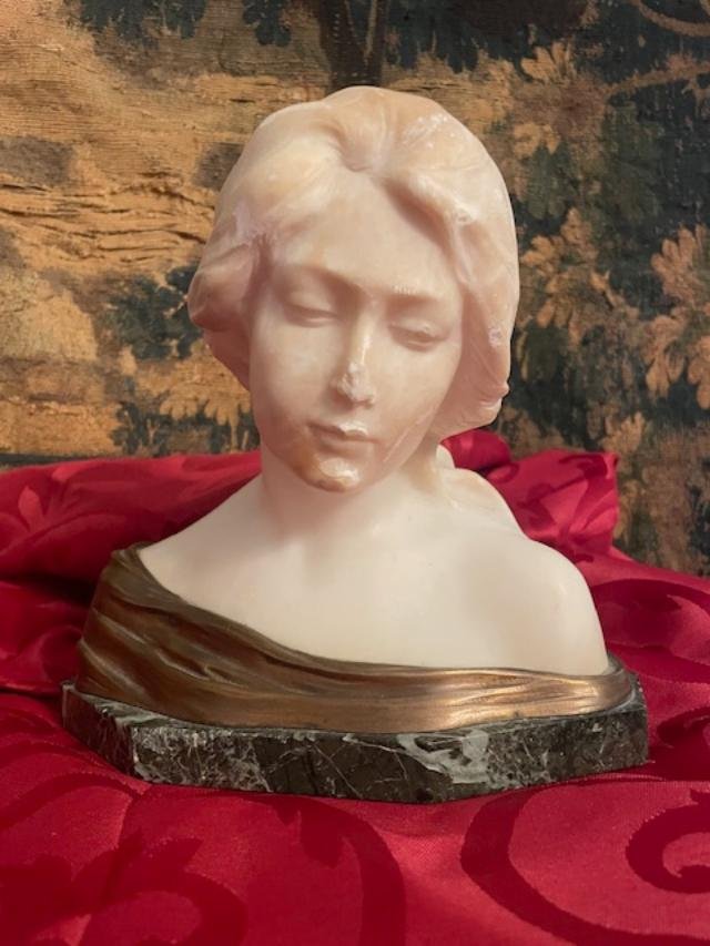 Bust Of A Young Woman On A Marble Base, Circa 1900