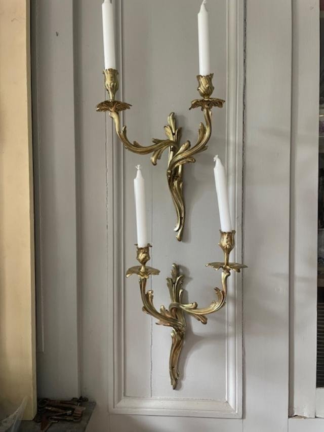 Pair Of Louis XV Wall Sconces In Gilded Bronze