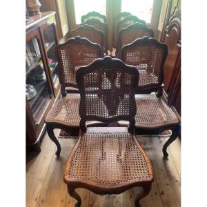 Suite de 9 chaises en bois naturel d'époque Louis XV au modèle