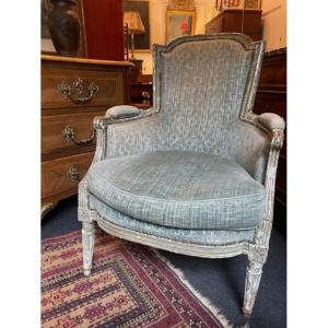 Bergère en bois laqué à coussin d'époque Louis XVI