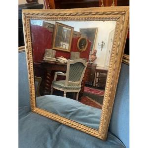 Miroir en bois doré d'époque Louis XVI