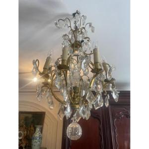 Lustre cage en bronze et cristal de style Louis XV