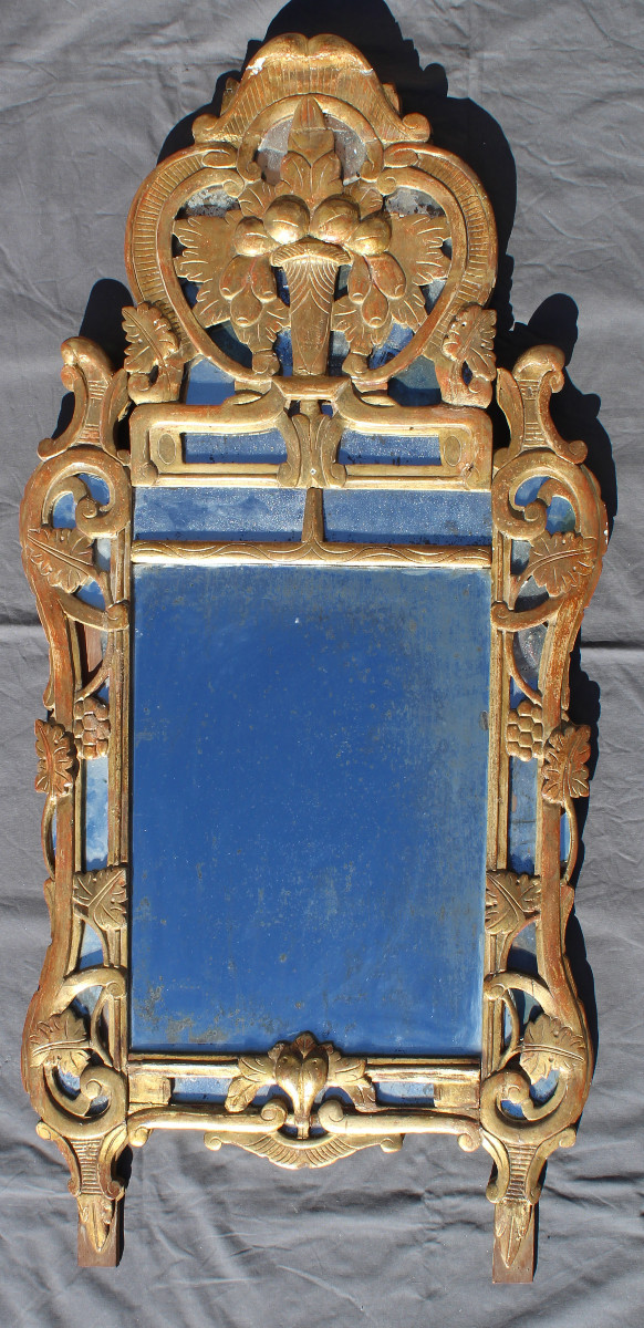 Grand miroir à parecloses dit de Beaucaire d' époque Louis XV en bois doré