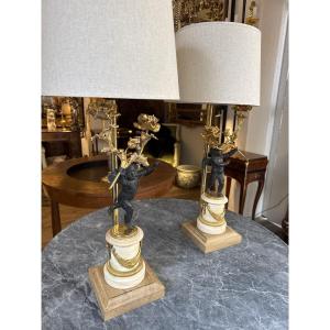 Paire de bougeoirs Louis xl