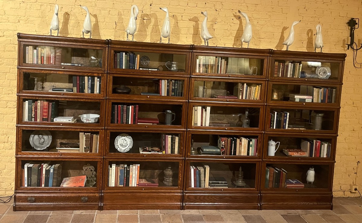 A Set Of Four Globe Wernicke Oak Bookcases- 19th Century