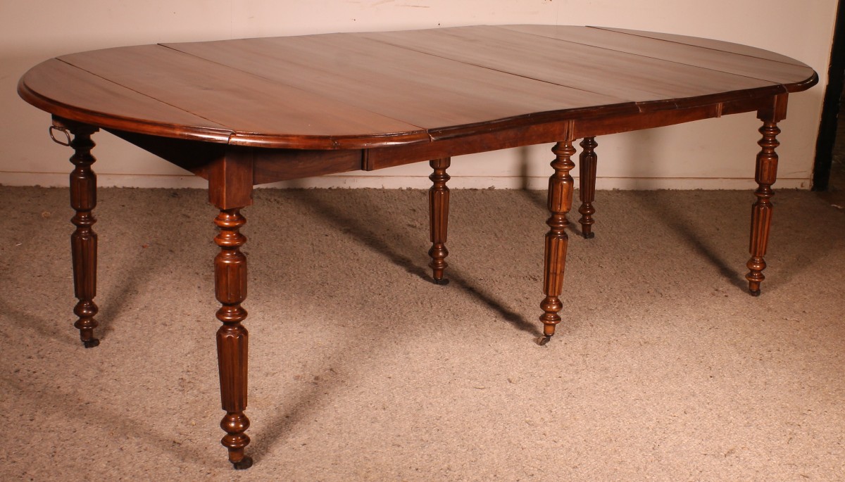 Table de salle à manger extensible du début du 19° siècle en noyer