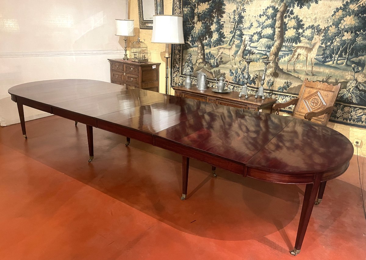 Table de salle à manger extensible d'époque directoire en acajou à bandeau de 4m
