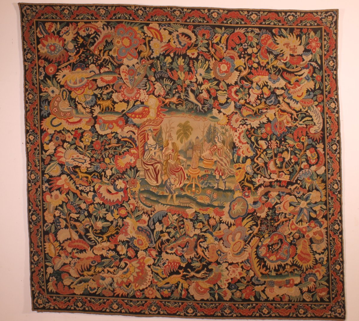 Tapisserie de Bruxelles du XIXᵉ siècle – Verdure fleurie et scène galante