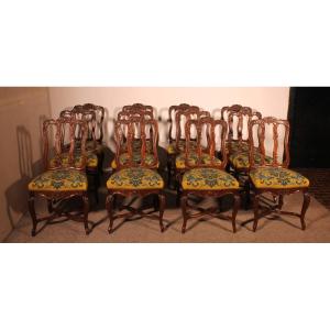 série de 12 chaises de style Louis XIV en chêne