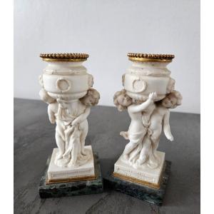 Pair Of Biscuit Putti