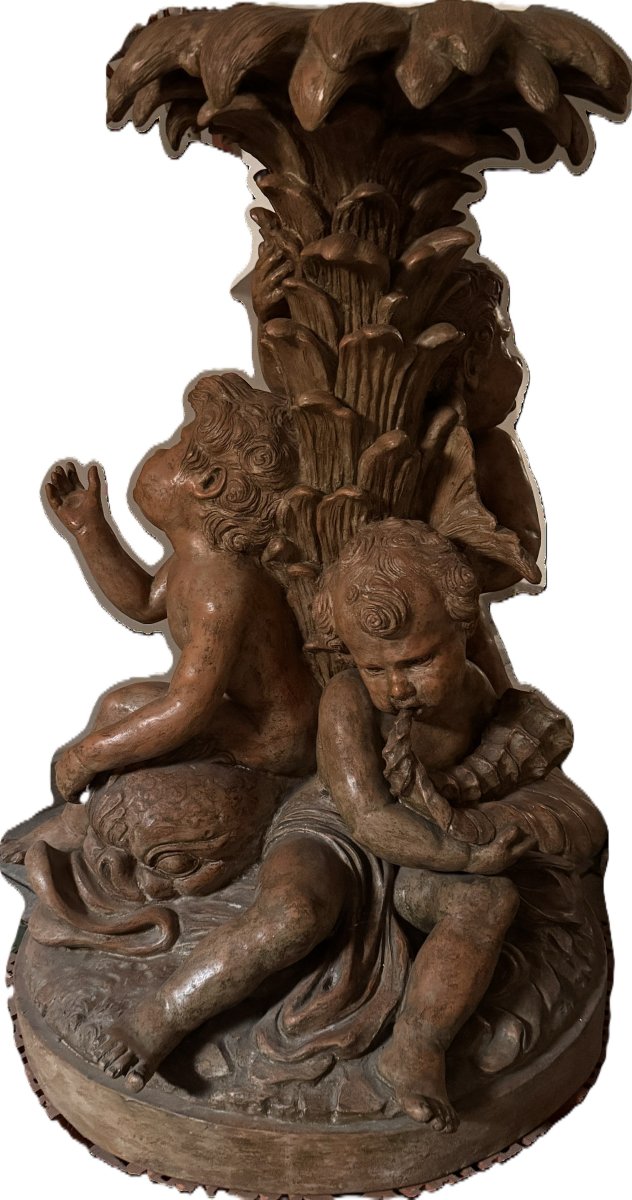 Grand groupe de putti en terre cuite 