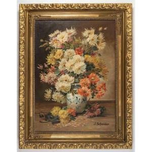 Un tableaux de fleurs chrysanthèmes, signé J Shneider