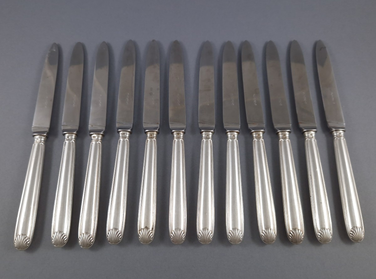 Puiforcat: 12 couteaux en argent massif coquilles