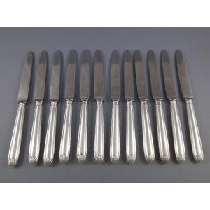 Puiforcat: 12 couteaux en argent massif coquilles