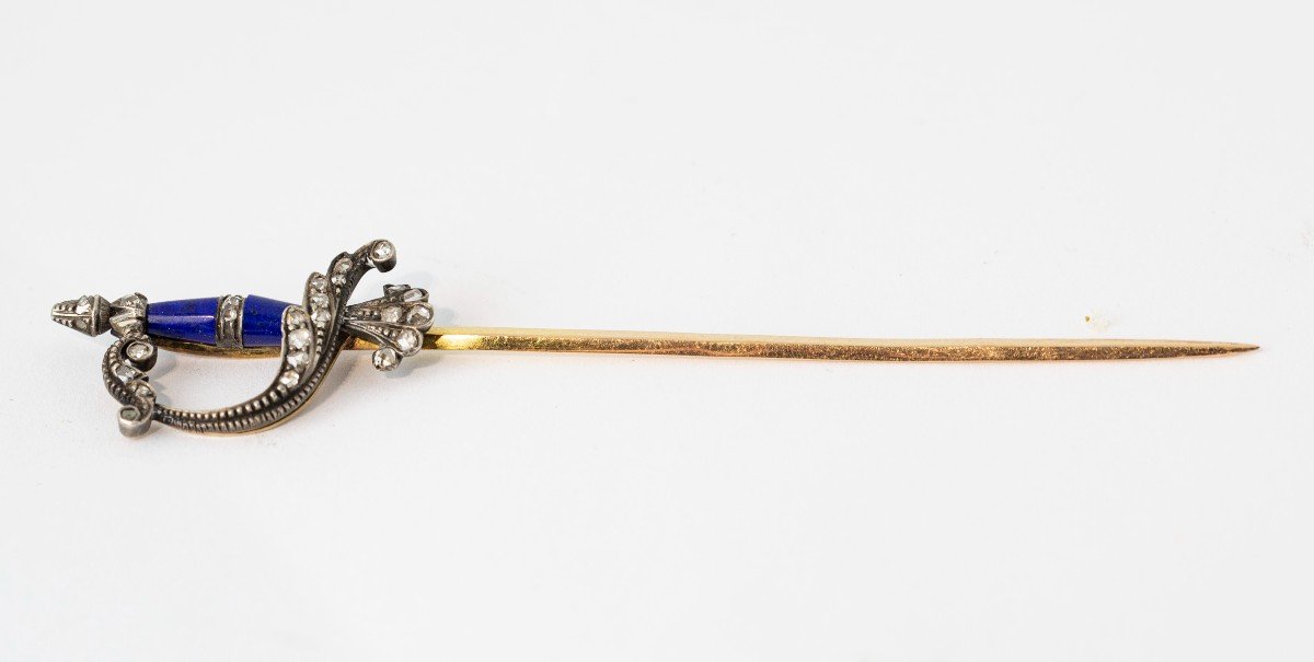 A Miniature Sword In Gold And Enamel