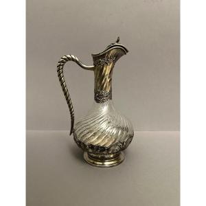 A Small Ewer In Sterling Silver And Engraved Crystal
