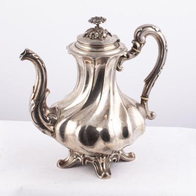 A Silver Coffee Pot In Baroque Style