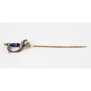 A Miniature Sword In Gold And Enamel