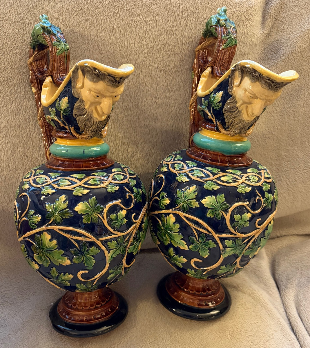 Pair Of Slipware Pitchers With A Character's Head