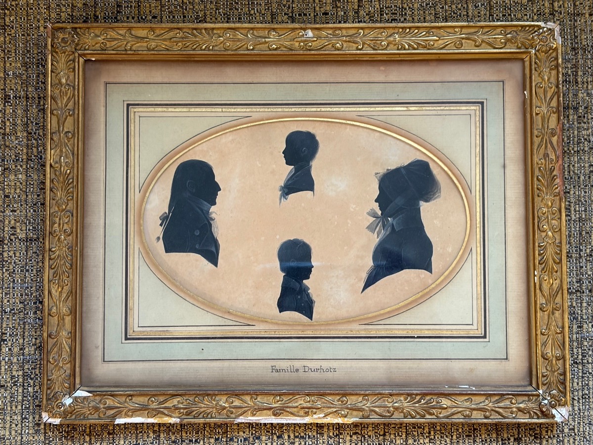 Silhouettes Of Four Members Of The Durhotz Family